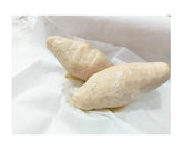 Two pieces of kokum on a white background