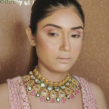 artist using small blending brush on model eyes